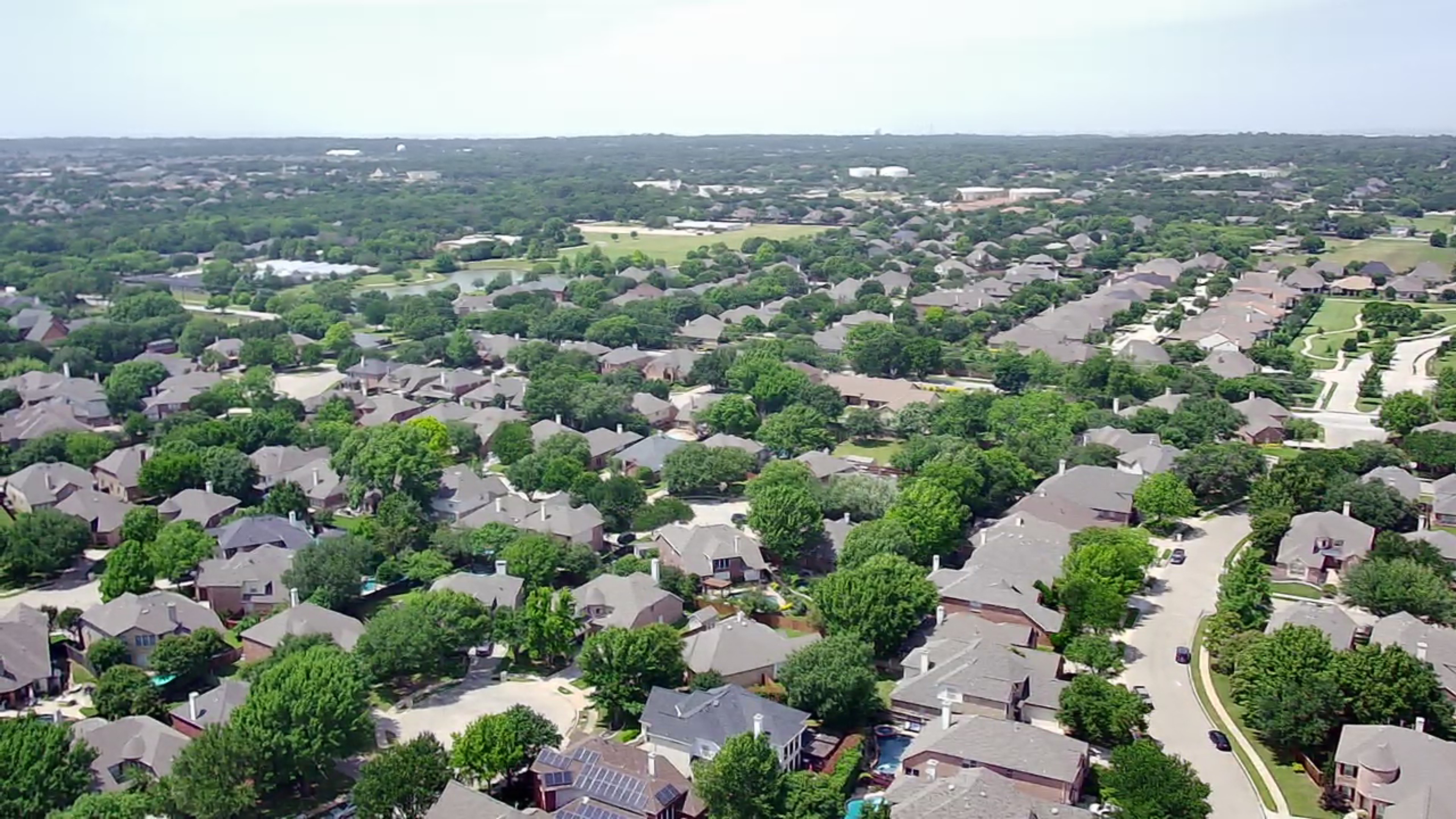 Storm damage visible on a Keller, TX roof near 76244 — Charli b on patrol inspecting lifted shingles and hail bruising for the Rooftop Scout Report.